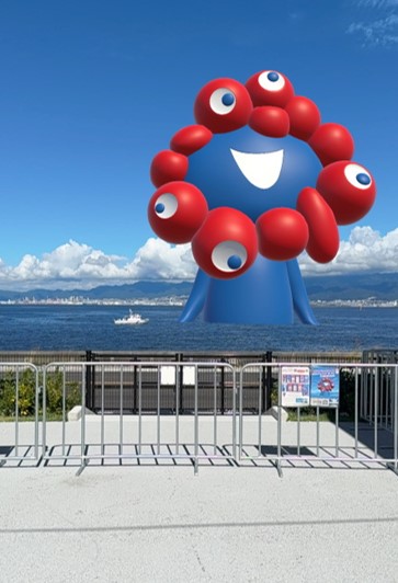海からARミャクミャクが顔を出している画像